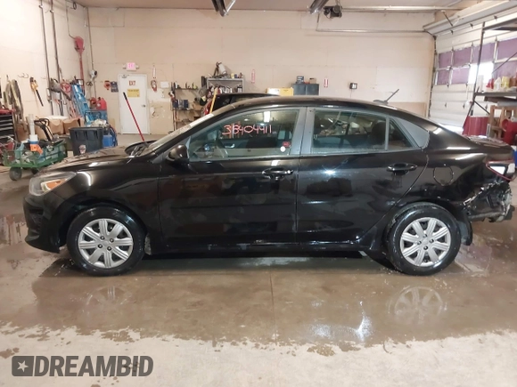 2021 Kia Rio LX with VIN 3KPA24AD9ME385515, listed as a IAAI auction lot 38404411 with 79,615 mi miles. Bid and sale history available at carsss.com. Image 15.