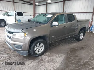 2015 Chevrolet Colorado 2WD WT z VIN 1GCGSAE34F1270479, wystawiony jako IAAI lot #41768612 z przebiegiem 158 984 mil mil oraz . Historia ofert i sprzedaży dostępna na DreamBid. Obrazek 17.