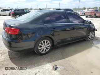 2014 Volkswagen Jetta SE with VIN 3VWD07AJ7EM293656, listed as a Copart auction lot 55077455 with 82,160 mi miles and Salvage title. Bid and sale history available at DreamBid. Image 3.