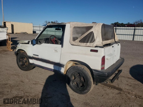 1990 Geo Tracker z VIN 2CNBJ18UXL6217744, wystawiony jako Copart lot #84203244 z przebiegiem 23 221 mil mil oraz Szkody całkowita. Historia ofert i sprzedaży dostępna na DreamBid. Obrazek 2.