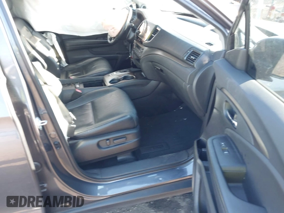 2021 Honda Pilot Special Edition with VIN 5FNYF6H25MB041029, listed as a IAAI auction lot 41894494 with 35,576 mi miles and . Bid and sale history available at DreamBid. Image 5.