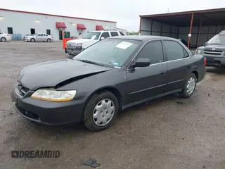 1999 Honda Accord LX with VIN 1HGCG5647XA154131, listed as a IAAI auction lot 41962701 with 126,673 mi miles and . Bid and sale history available at DreamBid. Image 2.