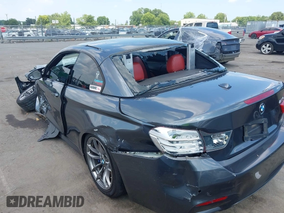 2015 BMW M4 with VIN WBS3U9C5XFJ967725, listed as a IAAI auction lot 42593444 with Not provided miles and . Bid and sale history available at DreamBid. Image 3.