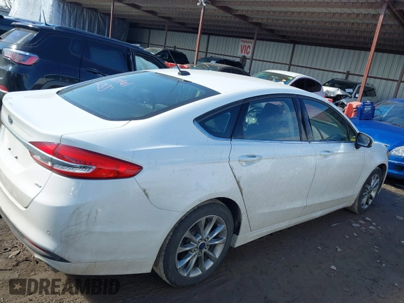 2017 Ford Fusion SE z VIN 3FA6P0H77HR277995, wystawiony jako IAAI lot #41586483 z przebiegiem 191 912 mil mil oraz . Historia ofert i sprzedaży dostępna na DreamBid. Obrazek 13.