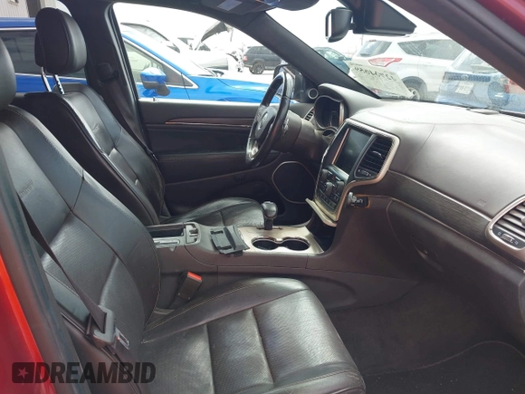 2014 Jeep Grand Cherokee Summit z VIN 1C4RJFJT4EC423217, wystawiony jako IAAI lot #42704059 z przebiegiem 245 928 mil mil oraz . Historia ofert i sprzedaży dostępna na DreamBid. Obrazek 5.