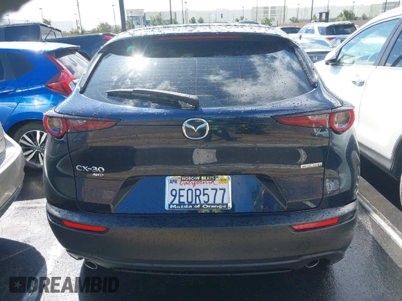 2023 Mazda CX-30 S with VIN 3MVDMBAM9PM541315, listed as a IAAI auction lot 41758162 with 46,296 mi miles and . Bid and sale history available at carsss.com. Image 12.