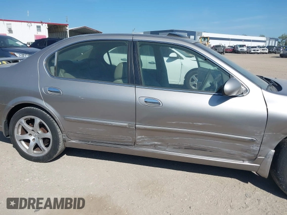 2003 Nissan Maxima GLE z VIN JN1DA31A83T411224, wystawiony jako IAAI lot #41905714 z przebiegiem Nie podano mil oraz . Historia ofert i sprzedaży dostępna na DreamBid. Obrazek 17.