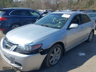 2004 Acura TSX w/Navigation with VIN JH4CL96904C039320, listed as a IAAI auction lot 42083615 with 195,844 mi miles. Bid and sale history available at carsss.com. Image 2.