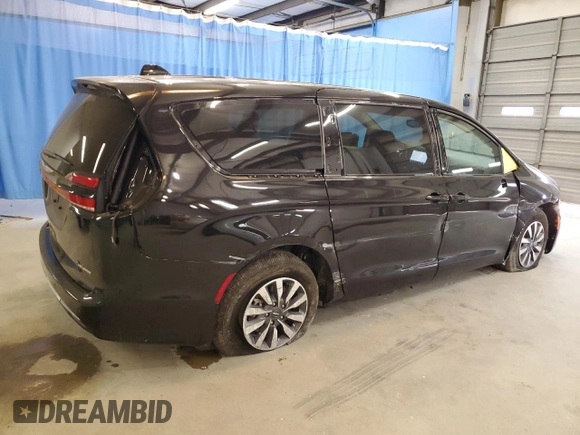2024 Chrysler Pacifica Hybrid Select z VIN 2C4RC1S77RR158336, wystawiony jako Copart lot #54831295 z przebiegiem 30 950 mil mil oraz Czysty tytuł • Clean title. Historia ofert i sprzedaży dostępna na DreamBid. Obrazek 3.