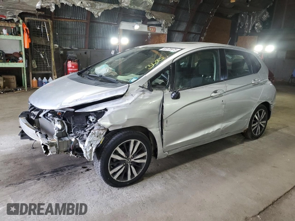 2015 Honda Fit EX-L with VIN 3HGGK5H86FM754172, listed as a Copart auction lot 60870975 with 74,377 mi miles and Salvage title. Bid and sale history available at DreamBid. Image 1.