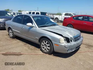 2005 Kia Optima LX z VIN KNAGD128155388259, wystawiony jako IAAI lot #42028030 z przebiegiem 195 548 mil mil oraz . Historia ofert i sprzedaży dostępna na DreamBid. Obrazek 1.