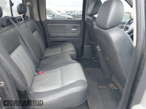 2008 Dodge Dakota Laramie with VIN 1D7HW58NX8S602604, listed as a IAAI auction lot 41717006 with 167,023 mi miles. Bid and sale history available at carsss.com. Image 8.
