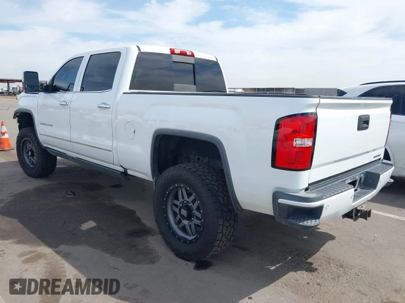 2016 GMC Sierra 2500HD Denali z VIN 1GT12UE88GF170375, wystawiony jako IAAI lot #41885873 z przebiegiem 150 108 mil mil oraz . Historia ofert i sprzedaży dostępna na DreamBid. Obrazek 3.