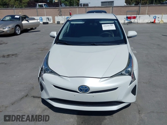 2017 Toyota Prius Two with VIN JTDKBRFU8H3034280, listed as a IAAI auction lot 42645785 with 127,553 mi miles and . Bid and sale history available at DreamBid. Image 12.