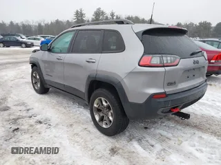 2019 Jeep Cherokee Trailhawk z VIN 1C4PJMBX2KD298169, wystawiony jako IAAI lot #41412123 z przebiegiem 63 214 mil mil oraz . Historia ofert i sprzedaży dostępna na DreamBid. Obrazek 3.