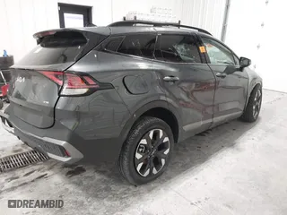 2023 Kia Sportage Plug-In Hybrid X-Line with VIN KNDPYDAH5P7114113, listed as a IAAI auction lot 41346065 with 5,625 mi miles. Bid and sale history available at carsss.com. Image 4.