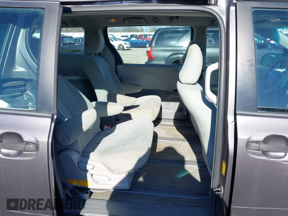 2014 Toyota Sienna L with VIN 5TDZK3DC3ES506658, listed as a IAAI auction lot 41469391 with 169,848 mi miles. Bid and sale history available at carsss.com. Image 8.