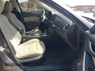 2014 Mazda 6 i Touring with VIN JM1GJ1V55E1105379, listed as a IAAI auction lot 42010585 with 153,870 mi miles and . Bid and sale history available at DreamBid. Image 5.