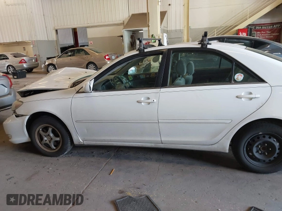 2004 Toyota Camry LE with VIN JTDBE32K540257588, listed as a IAAI auction lot 42208098 with 201,770 mi miles and . Bid and sale history available at DreamBid. Image 14.