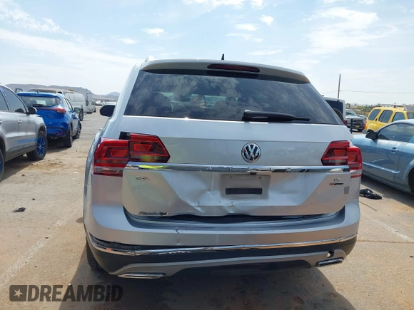 2018 Volkswagen Atlas SEL with VIN 1V2MR2CAXJC537383, listed as a IAAI auction lot 42353413 with 121,626 mi miles and . Bid and sale history available at DreamBid. Image 16.