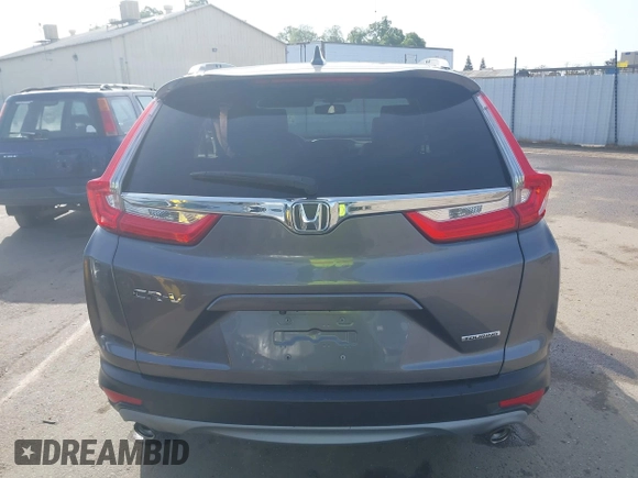 2018 Honda CR-V Touring with VIN 7FARW1H93JE027294, listed as a IAAI auction lot 41903484 with 80,999 mi miles and . Bid and sale history available at DreamBid. Image 17.