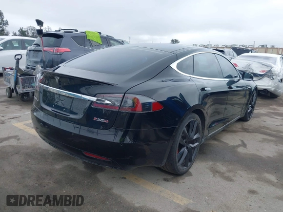 2018 Tesla Model S 75D with VIN 5YJSA1E42JF265691, listed as a IAAI auction lot 41886105 with 99,485 mi miles and . Bid and sale history available at DreamBid. Image 4.