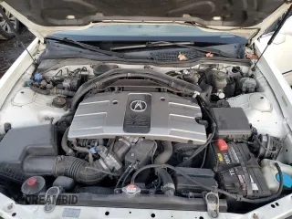 2004 Acura RL w/Navigation System with VIN JH4KA966X4C001987, listed as a Copart auction lot 84900254 with 151,465 mi miles and Clean Title. Bid and sale history available at carsss.com. Image 11.