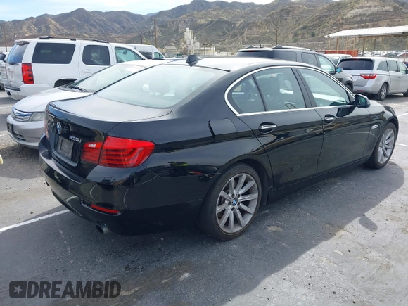 2014 BMW 5 Series 535i with VIN WBA5B1C54ED476763, listed as a IAAI auction lot 41590236 with 115,048 mi miles and . Bid and sale history available at DreamBid. Image 4.