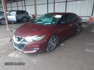 2016 Nissan Maxima SR z VIN 1N4AA6AP3GC434928, wystawiony jako IAAI lot #42180654 z przebiegiem 113 492 mil mil oraz . Historia ofert i sprzedaży dostępna na DreamBid. Obrazek 2.