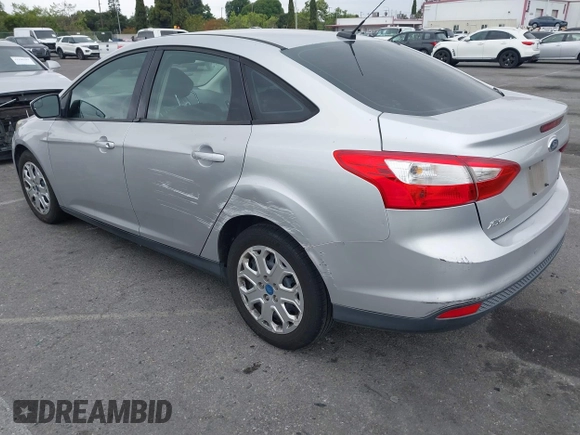 2012 Ford Focus SE with VIN 1FAHP3F27CL257447, listed as a IAAI auction lot 42180626 with 130,155 mi miles. Bid and sale history available at carsss.com. Image 3.