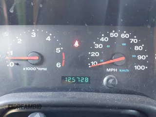 2002 Jeep Wrangler Sport z VIN 1J4FA49SX2P760671, wystawiony jako IAAI lot #41861841 z przebiegiem 125 728 mil mil oraz . Historia ofert i sprzedaży dostępna na DreamBid. Obrazek 7.