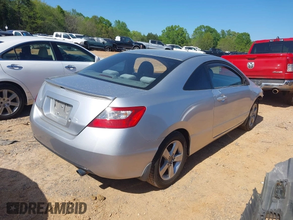 2010 Honda Civic Cpe LX with VIN 2HGFG1B67AH534169, listed as a IAAI auction lot 41998484 with 191,344 mi miles. Bid and sale history available at carsss.com. Image 4.