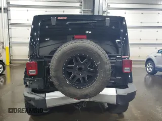 2012 Jeep Wrangler Unlimited Sahara with VIN 1C4BJWEG8CL235893, listed as a Copart auction lot 58195585 with 142,179 mi miles and Salvage title. Bid and sale history available at DreamBid. Image 6.