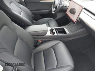 2023 Tesla Model Y Performance z VIN 7SAYGDEF7PF663387, wystawiony jako IAAI lot #42129258 z przebiegiem 42 691 mil mil oraz . Historia ofert i sprzedaży dostępna na DreamBid. Obrazek 5.