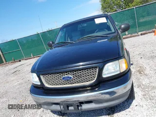 2003 Ford F-150 XLT with VIN 1FTRW07653KC18900, listed as a IAAI auction lot 41979710 with 99,525 mi miles. Bid and sale history available at carsss.com. Image 6.