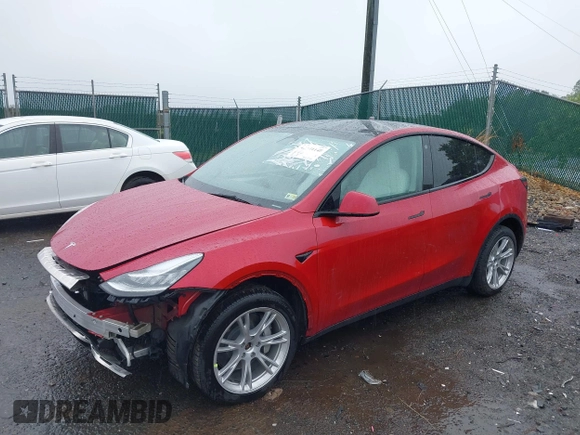 2023 Tesla Model Y Long Range with VIN 7SAYGDEE5PA111262, listed as a IAAI auction lot 42341148 with 19,014 mi miles and . Bid and sale history available at DreamBid. Image 19.
