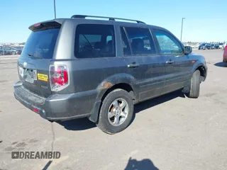 2007 Honda Pilot EX-L with VIN 2HKYF18667H501911, listed as a IAAI auction lot 41752356 with 267,277 mi miles and . Bid and sale history available at DreamBid. Image 4.