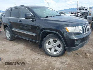 2011 Jeep Grand Cherokee Laredo z VIN 1J4RR4GG1BC522591, wystawiony jako IAAI lot #41894024 z przebiegiem 148 514 mil mil oraz . Historia ofert i sprzedaży dostępna na DreamBid. Obrazek 1.