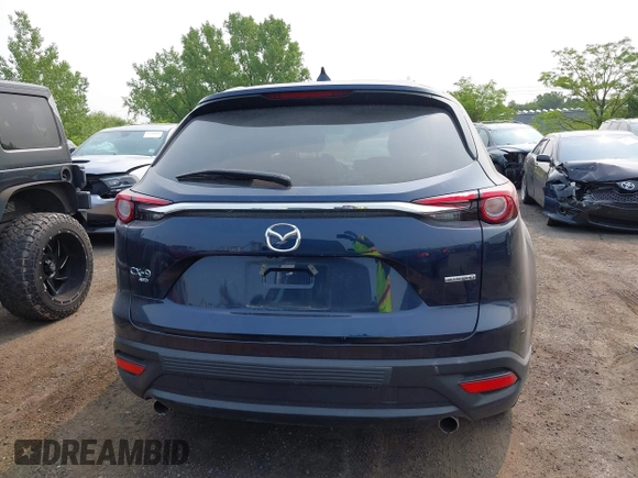 2023 Mazda CX-9 Touring with VIN JM3TCBCY6P0642838, listed as a IAAI auction lot 42407123 with 15,181 mi miles and . Bid and sale history available at DreamBid. Image 16.