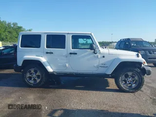2016 Jeep Wrangler Unlimited 75th Anniversary z VIN 1C4BJWEG1GL250449, wystawiony jako IAAI lot #42204012 z przebiegiem 180 173 mil mil oraz . Historia ofert i sprzedaży dostępna na DreamBid. Obrazek 13.