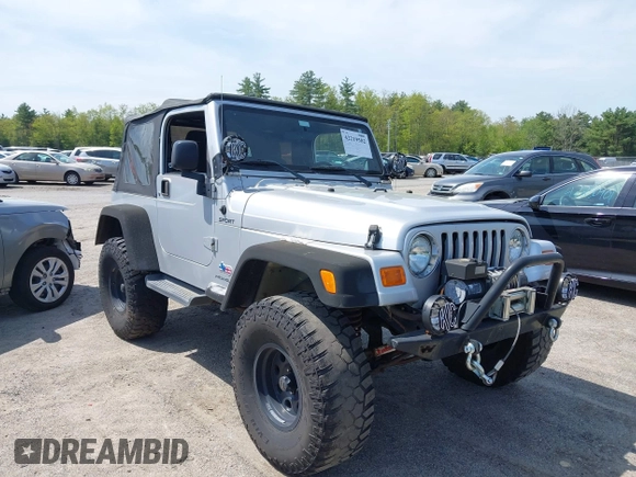 2003 Jeep Wrangler Sport z VIN 1J4FA49S73P302278, wystawiony jako IAAI lot #42219582 z przebiegiem 129 089 mil mil oraz . Historia ofert i sprzedaży dostępna na DreamBid. Obrazek 1.