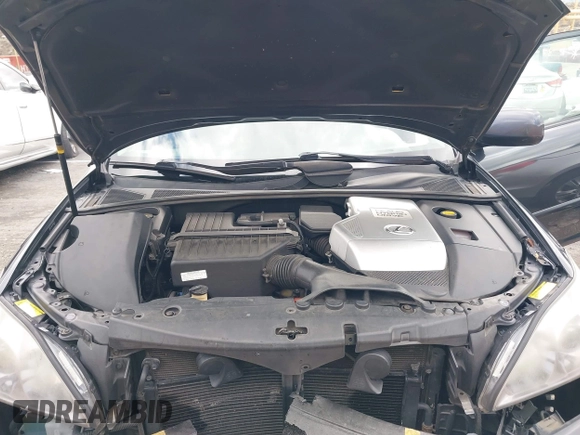 2008 Lexus RX 400h with VIN JTJGW31U382850234, listed as a IAAI auction lot 41556774 with 124,697 mi miles and . Bid and sale history available at DreamBid. Image 10.