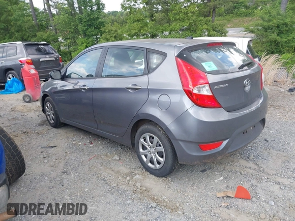 2014 Hyundai Accent GS with VIN KMHCT5AE3EU141605, listed as a IAAI auction lot 42157550 with 174,197 mi miles. Bid and sale history available at carsss.com. Image 3.