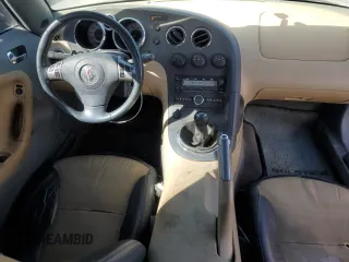 2006 Pontiac Solstice z VIN 1G2MB33B16Y107714, wystawiony jako Copart lot #70491744 z przebiegiem 53 925 mil mil oraz Szkoda całkowita • Salvage title. Historia ofert i sprzedaży dostępna na DreamBid. Obrazek 8.