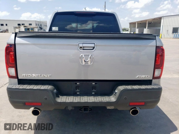 2021 Honda Ridgeline RTL-E with VIN 5FPYK3F73MB008806, listed as a Copart auction lot 62234825 with 84,716 mi miles and Salvage title. Bid and sale history available at DreamBid. Image 6.