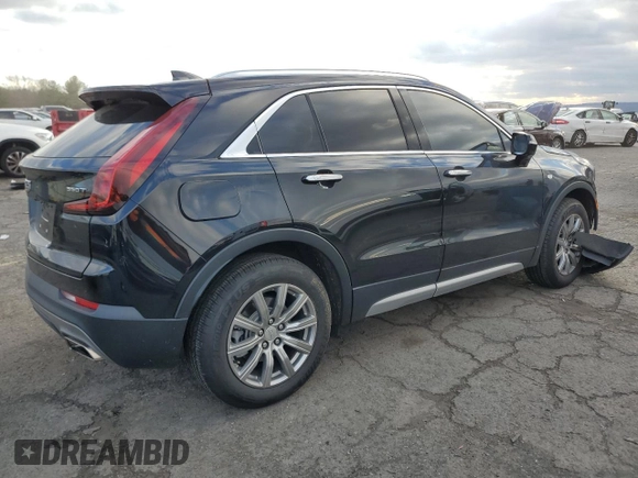 2021 Cadillac XT4 AWD Premium Luxury with VIN 1GYFZDR4XMF016846, listed as a Copart auction lot 82963704 with 44,063 mi miles and Salvage Title. Bid and sale history available at carsss.com. Image 3.