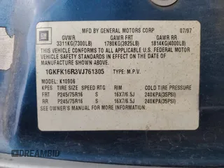 1997 GMC Suburban z VIN 1GKFK16R3VJ761305, wystawiony jako Copart lot #85785574 z przebiegiem 269 721 mil mil oraz Szkoda całkowita • Salvage title. Historia ofert i sprzedaży dostępna na DreamBid. Obrazek 13.
