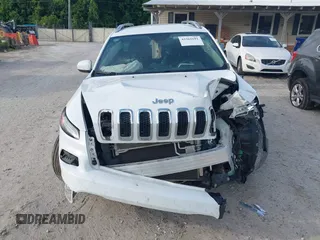 2018 Jeep Cherokee Latitude Plus z VIN 1C4PJLLX5JD511784, wystawiony jako IAAI lot #42361691 z przebiegiem 120 965 mil mil oraz . Historia ofert i sprzedaży dostępna na DreamBid. Obrazek 12.