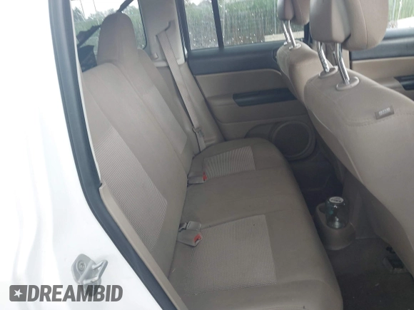 2013 Jeep Patriot Sport with VIN 1C4NJPBA8DD115719, listed as a IAAI auction lot 42591934 with 196,844 mi miles and . Bid and sale history available at DreamBid. Image 8.