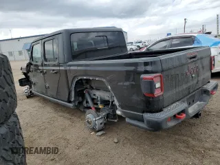 2023 Jeep Gladiator Rubicon with VIN 1C6JJTBG7PL573197, listed as a Copart auction lot 53866075 with 19,521 mi miles and Salvage title. Bid and sale history available at DreamBid. Image 2.